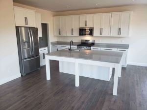 lvp lvt luxury vinyl plank tile flooring installation in kitchen